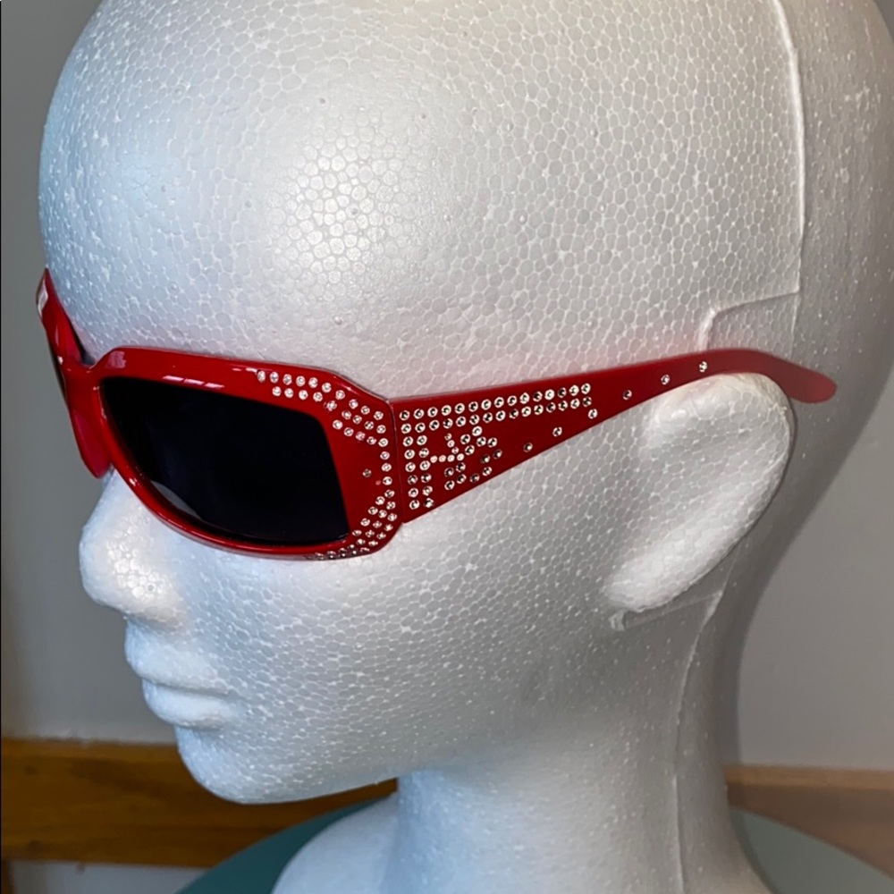 Girls blinged out red sunglasses!